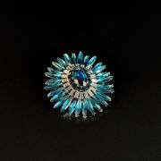 Floral blue-green crystal star brooch